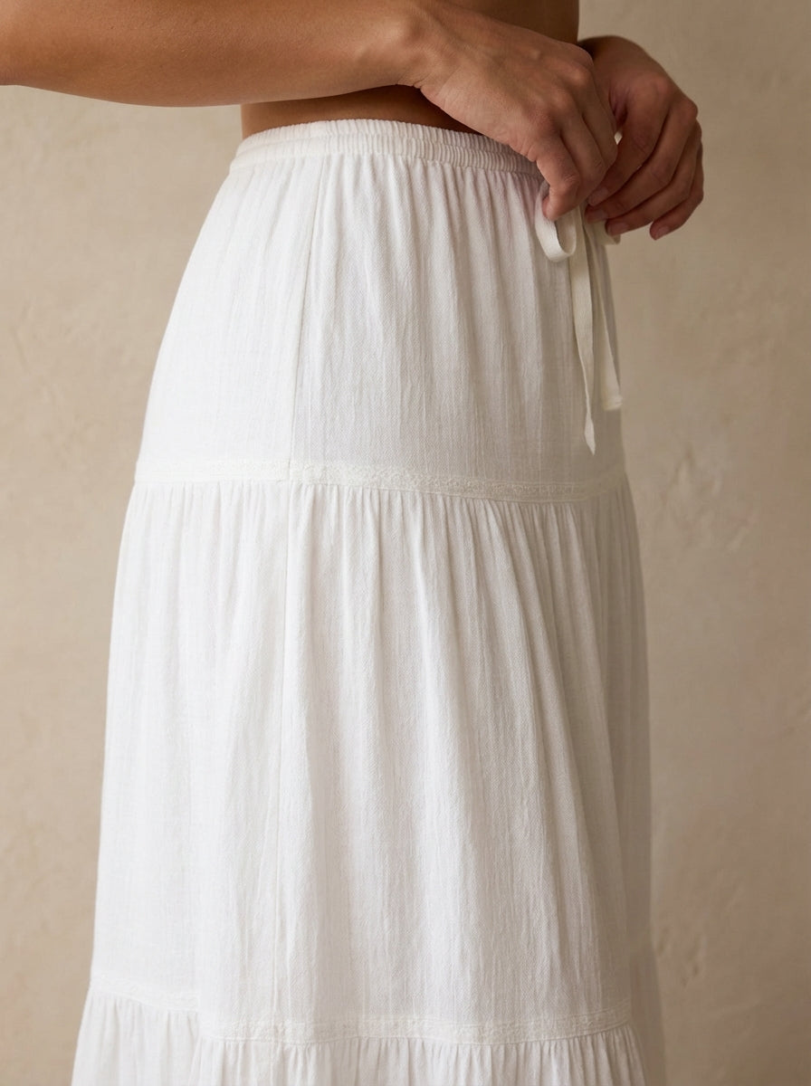 Falda con lazo y dobladillo con volantes